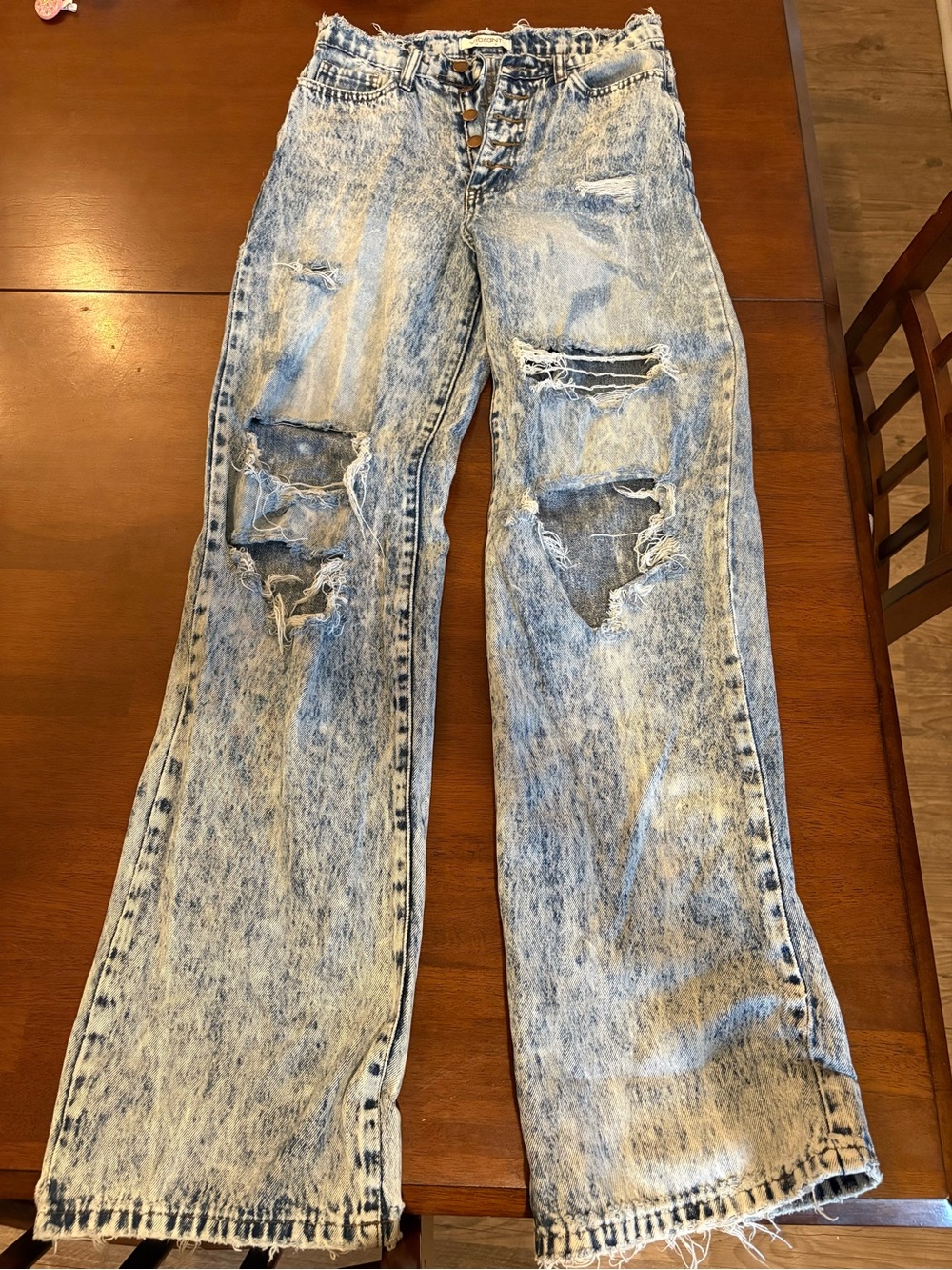 Vibrant Light Blue Acid Wash Flare Jeans with Knee Rips